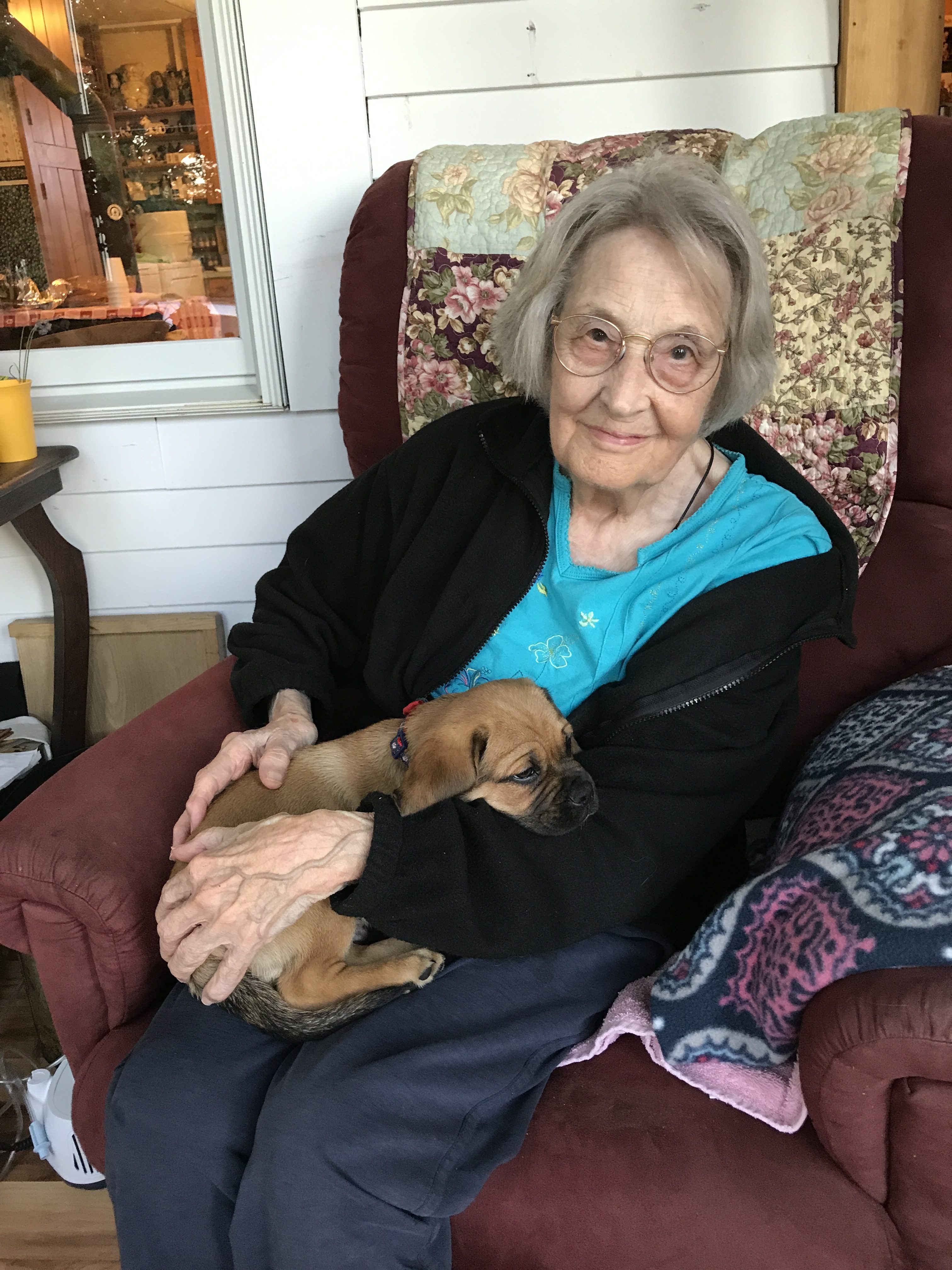 Grandma Holding a Puppy