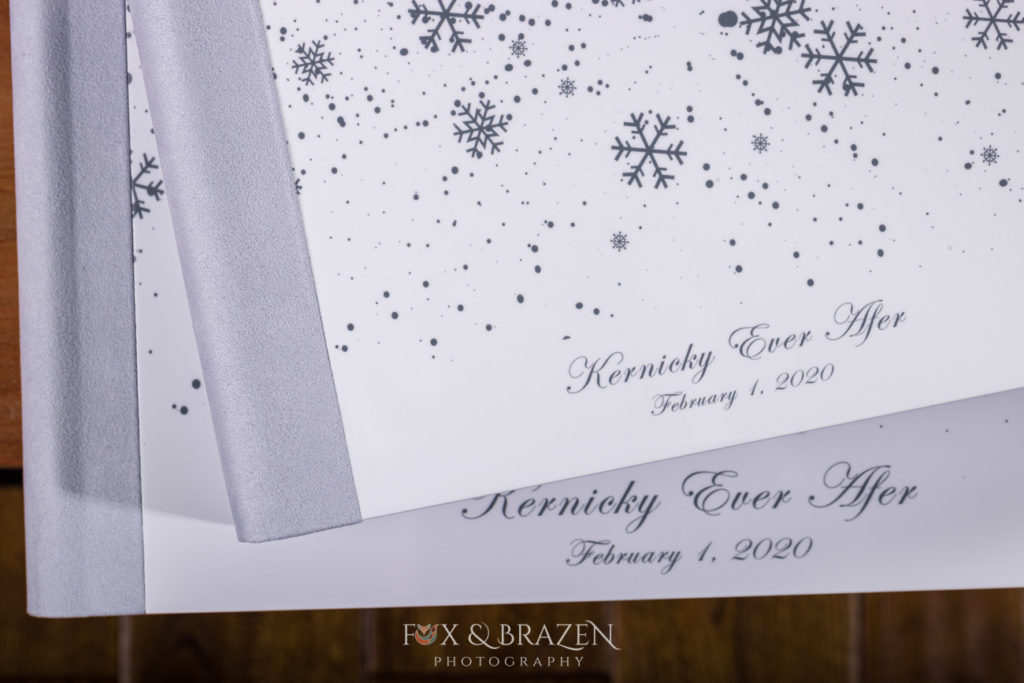Stunning white metal cover on companion wedding album with snow theme