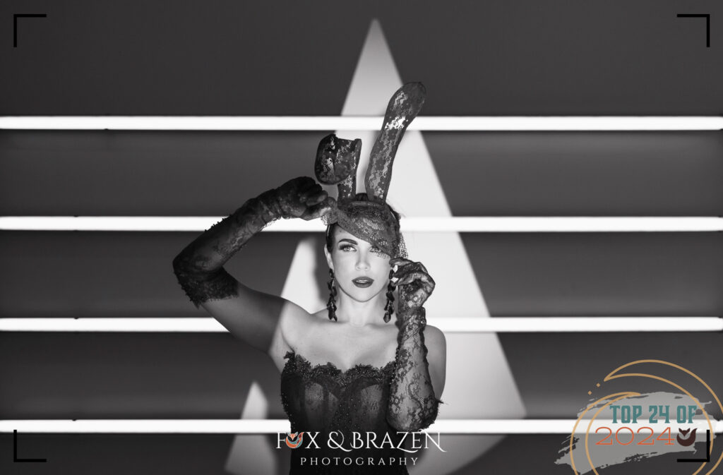 Striking black-and-white image showcasing a confident pose full of personality.
