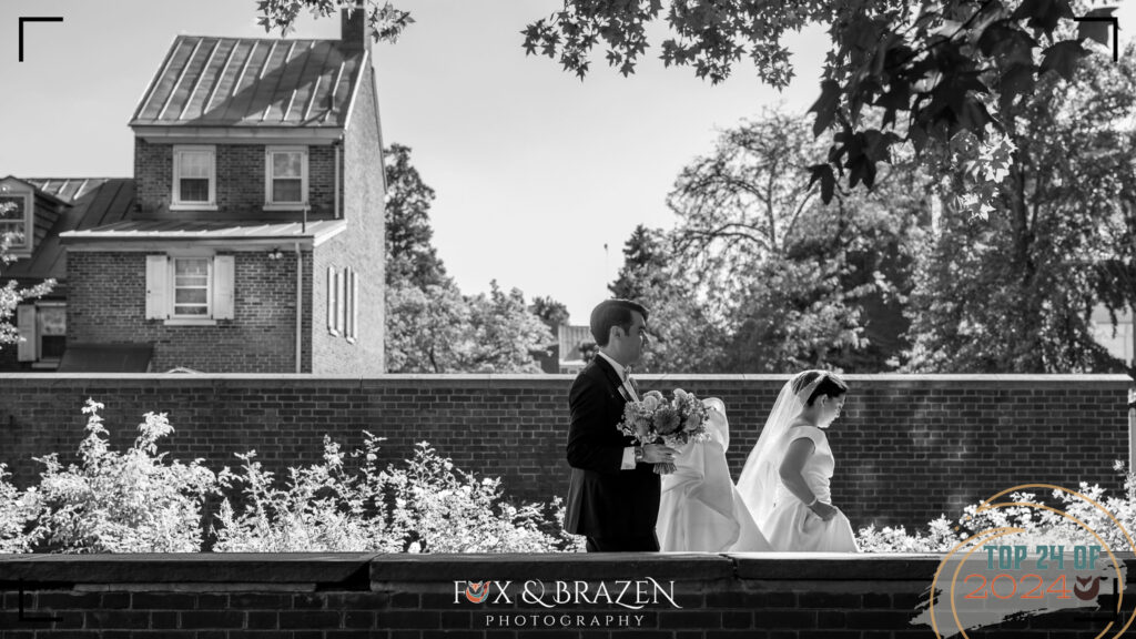 Bride and groom walking elegantly in old city Philadelphia in 2024.