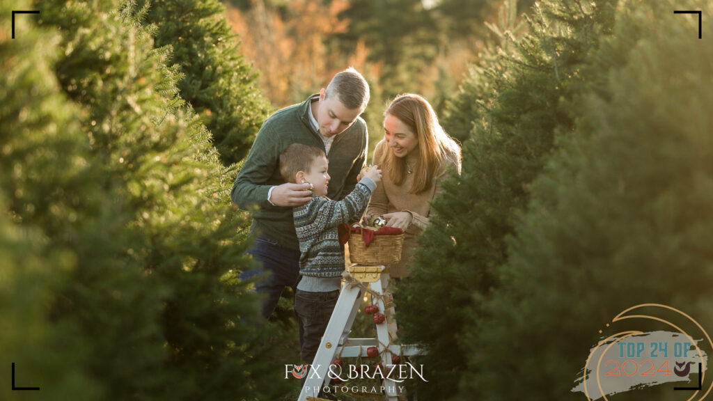 Family admiring ornaments on a Christmas tree farm.