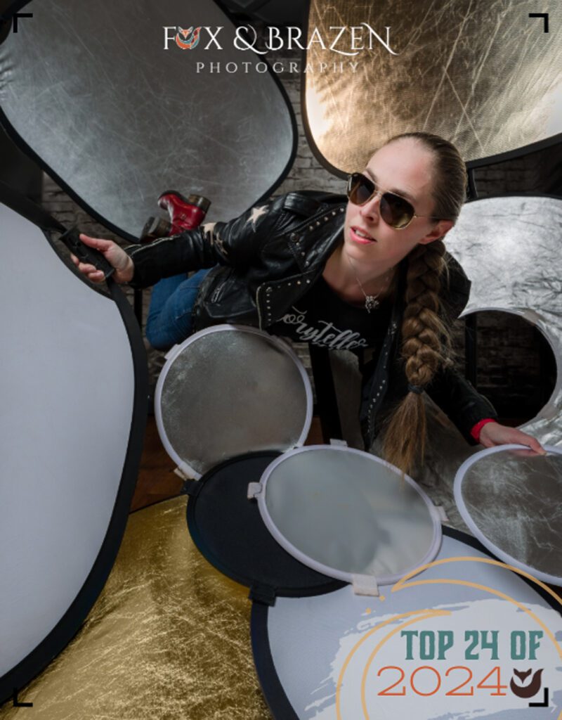 Jen Stitt surrounded by her reflectors during a WPPI self-portrait session in 2024.