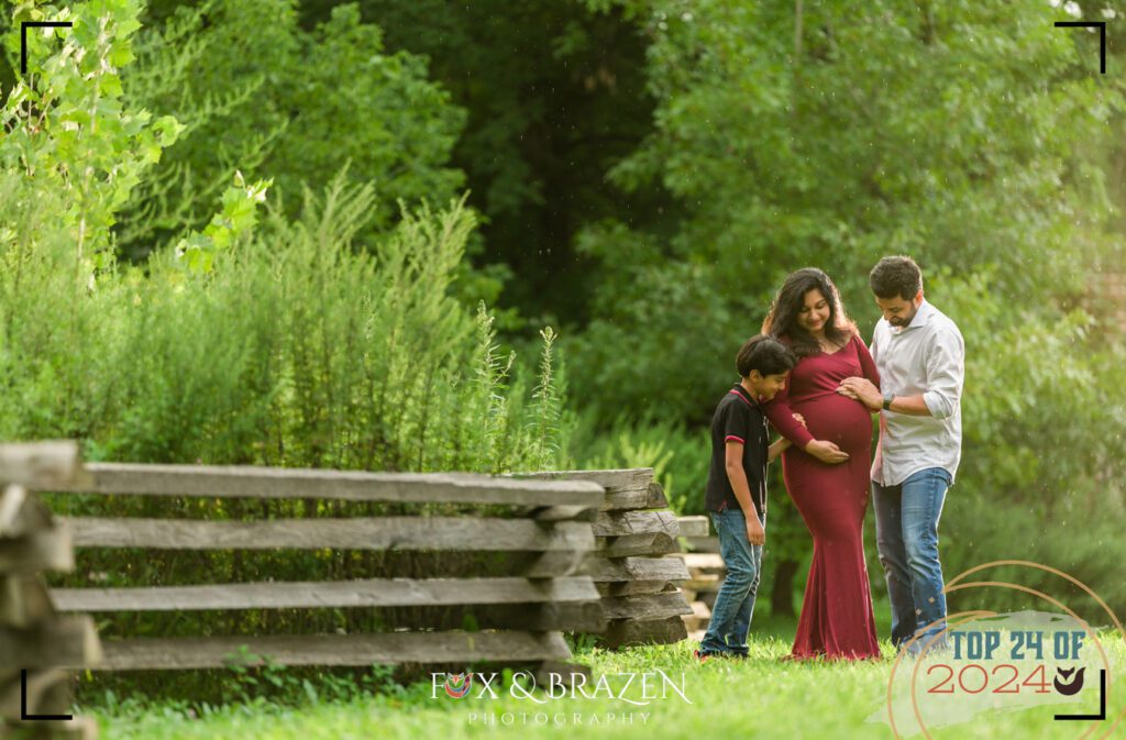 Family of three during a rainy Valley Forge maternity session.